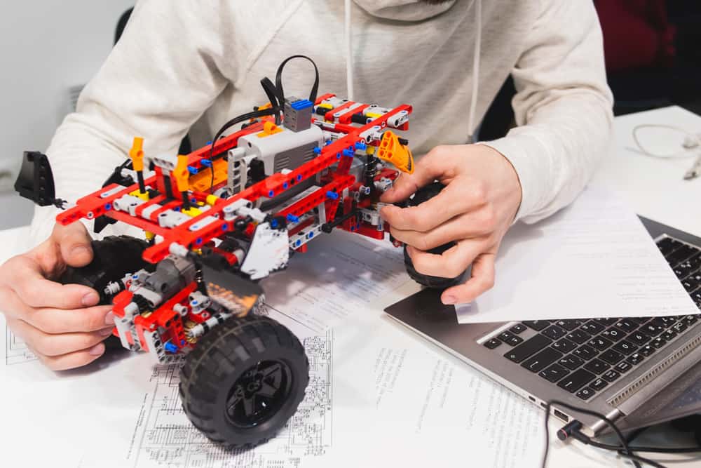 This is a close look at a  constructed toy truck made of lego pieces.