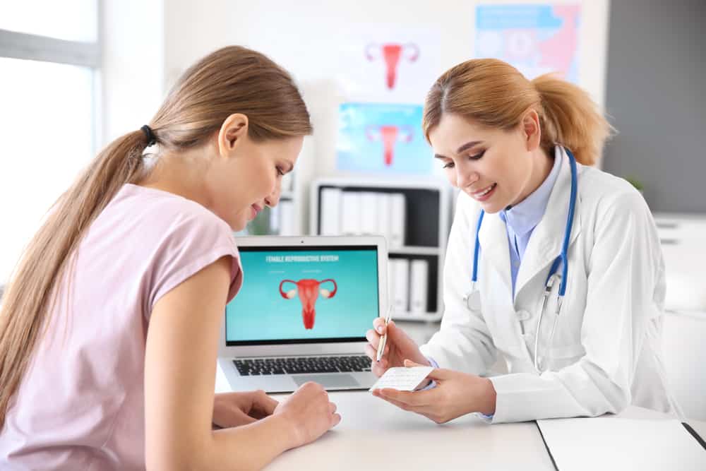 This is a woman having a check-up visitation with her gynecologist.