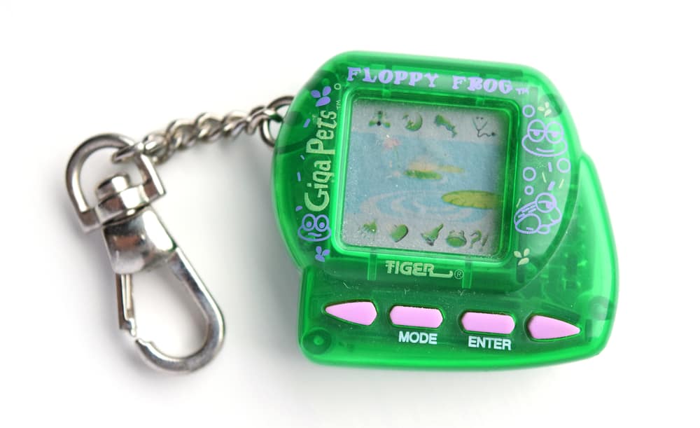 This is a close look at a Giga Pets Floppy Frog miniature game.