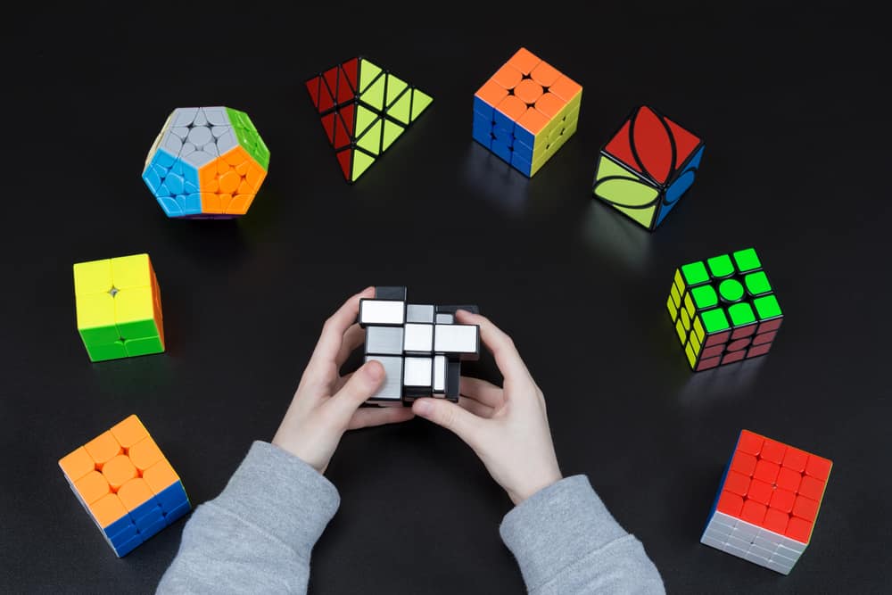 This is a close look at a collection of various Rubik's cube variations.