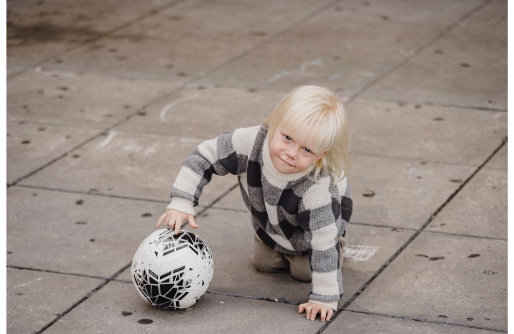 10 Fun Activities for 9 Month Old Baby 3 Ball Rolling