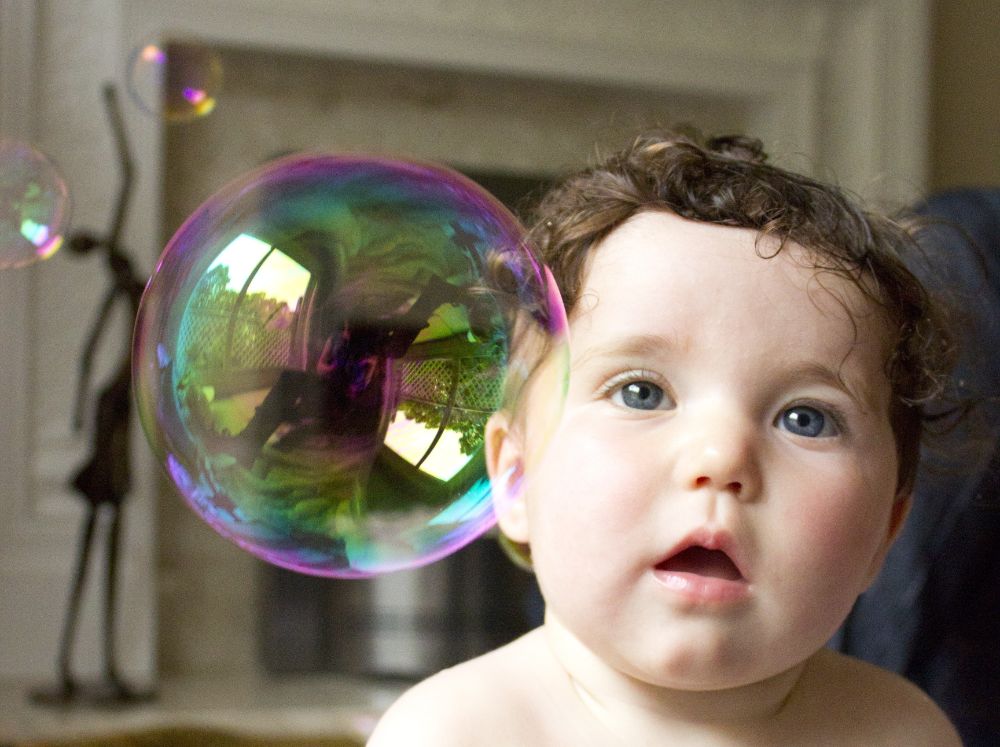 Exciting Baby Activities for Your 5-Month-Old 5 Chasing the Bubbles.
