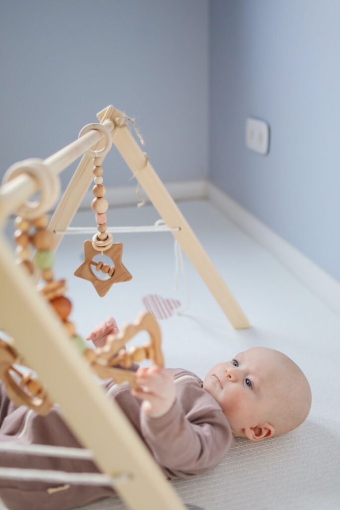 Exciting Baby Activities for Your 5-Month-Old 3 Playing with Rattles.