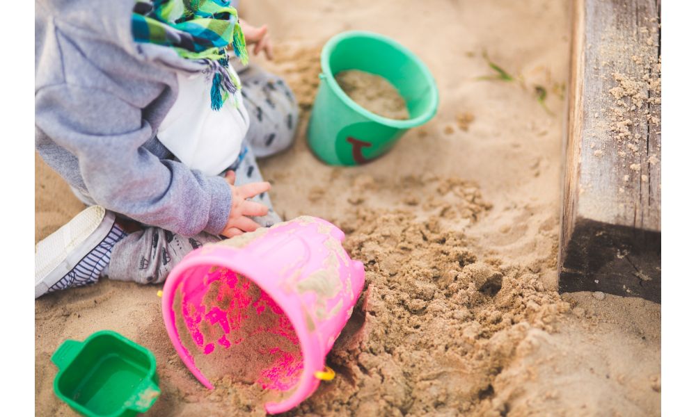32 Fun Ways to Keep Your 1-Year-Old Entertained Outdoors 5 Sand Buckets.