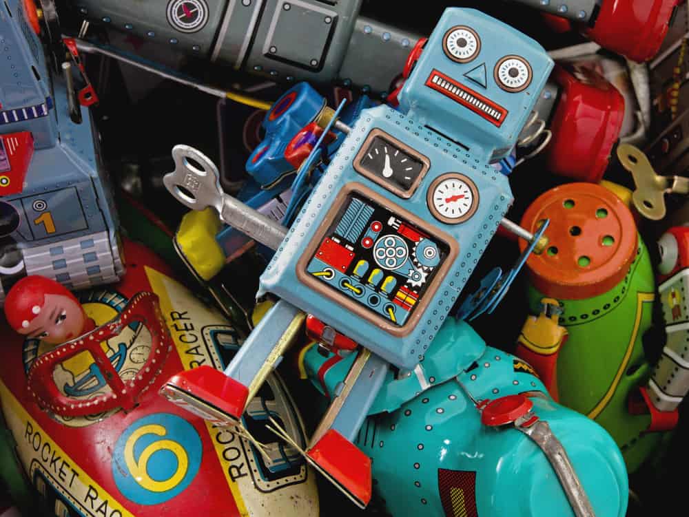 What to Do with Broken Toys: Repair or Recycle? 3 This is a close look at a bunch of toys made of tin.
