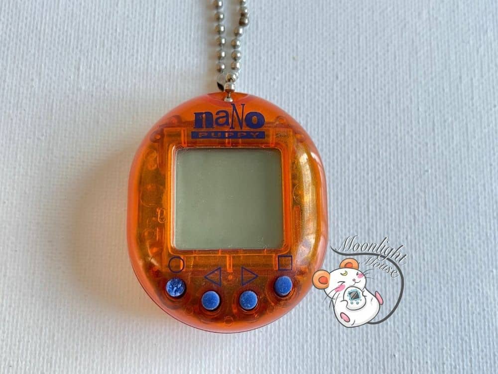 Nano Puppy Transparent Clear Orange Playmates Virtual Pet 1998