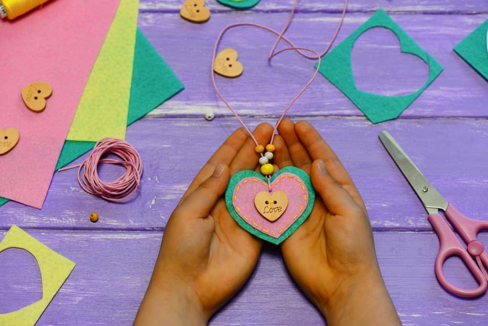 Close look at a piece of makeshift arts and crafts jewelry.