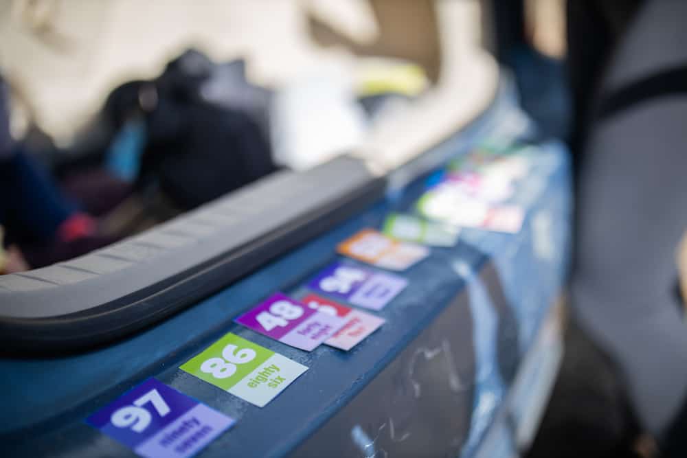 A close look at bumper stickers with numbers.