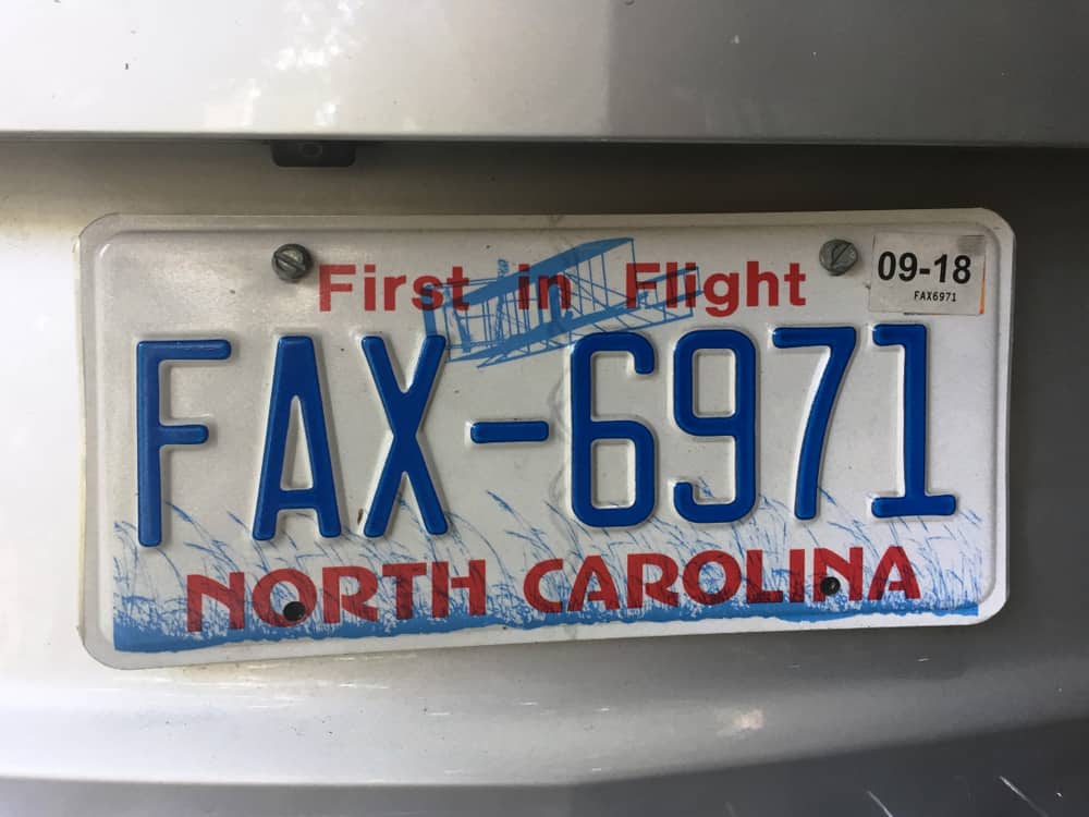 A close look at a North Carolina License Plate.