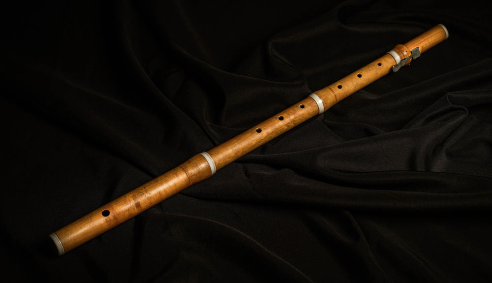 This is a close look at a wooden baroque flute.