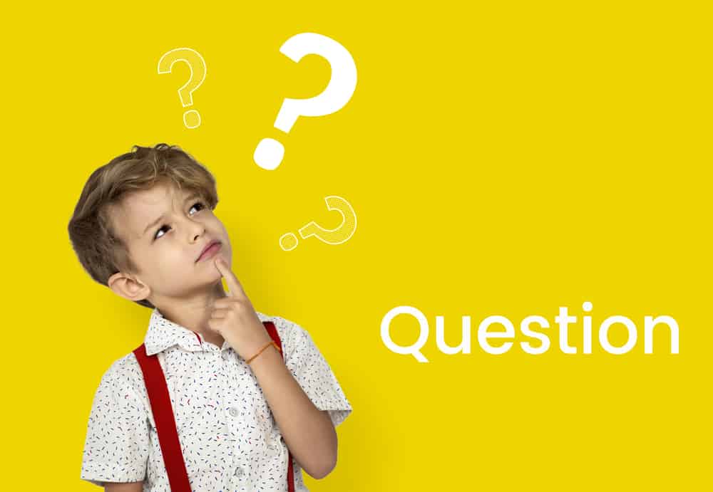questions-for-kids A young boy thinking of questions.