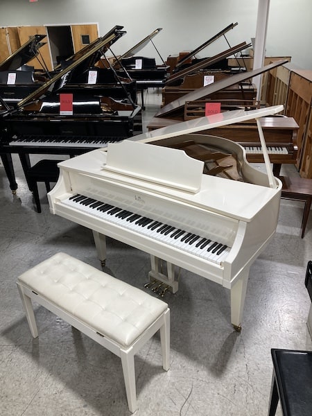11 Popular Types of Pianos 6 The 1980 Kimball Petite Grand Piano from Piano Man Superstore.