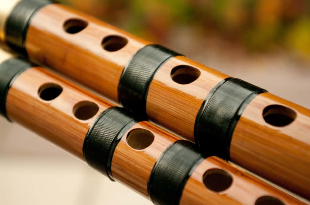 This is a close look at a couple of bamboo dizi flutes.