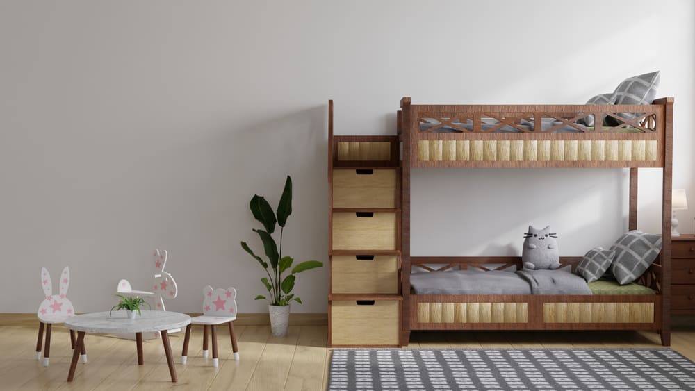 Kid's bedroom with a wooden bunk bed, a marble table, and a checkered area rug.