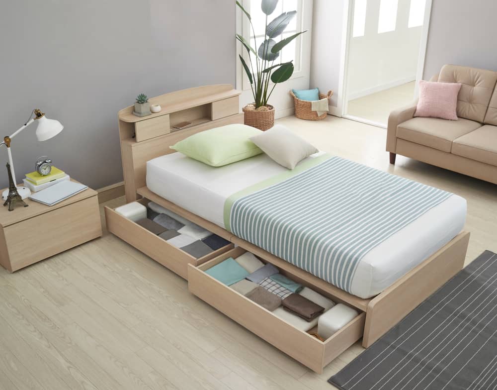 Modern bedroom with a cabin bed paired with a matching nightstand.