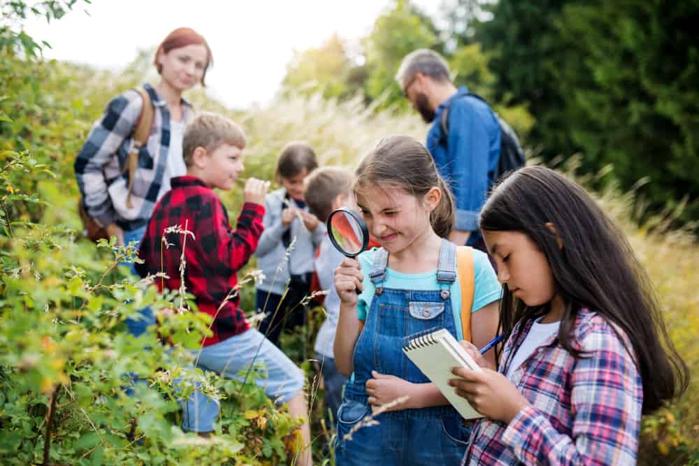 Kids doing scavenger hunt.