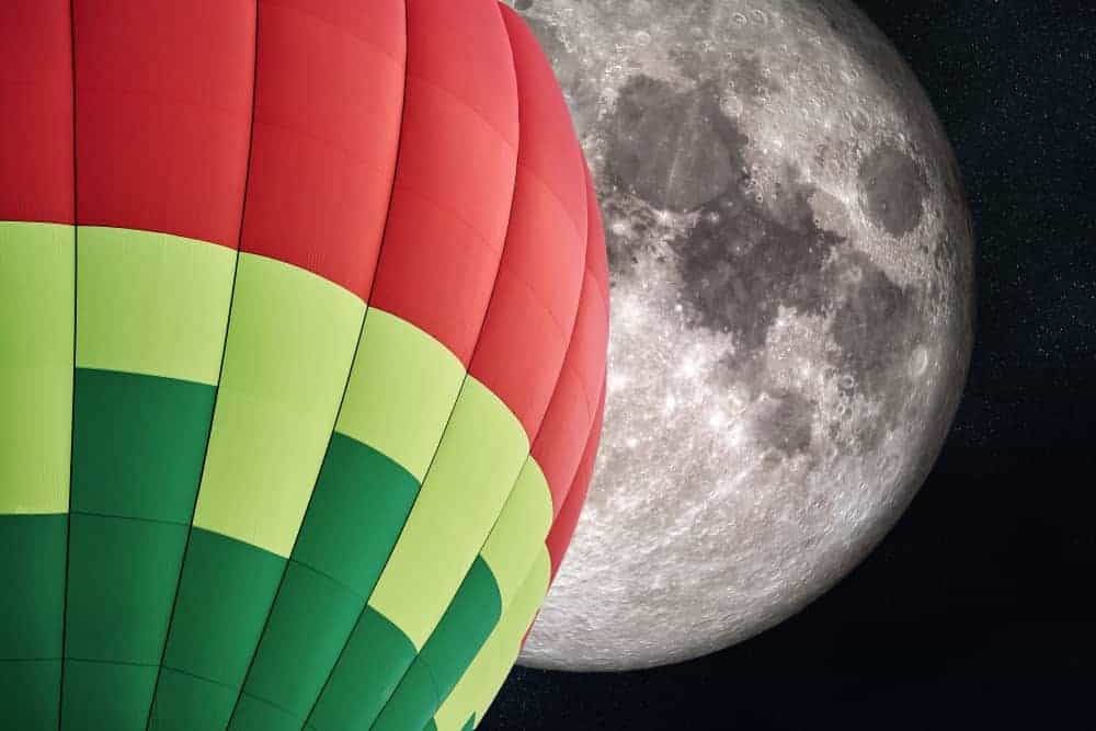 Balloon against an image of the moon.
