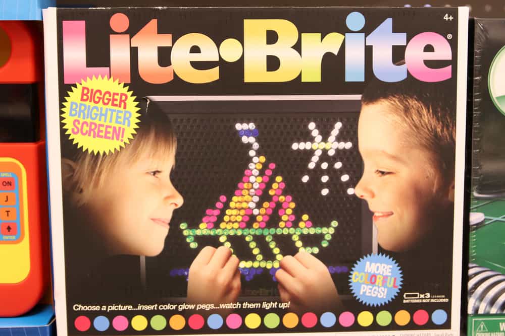 The box of the original Lite Brite toy on display at a toy store.