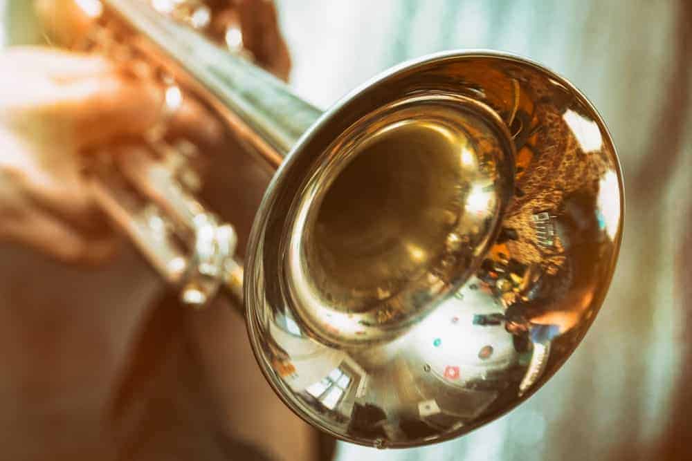 9 Popular Types of Trumpets Explained 14 Close-up of brass trumpet.