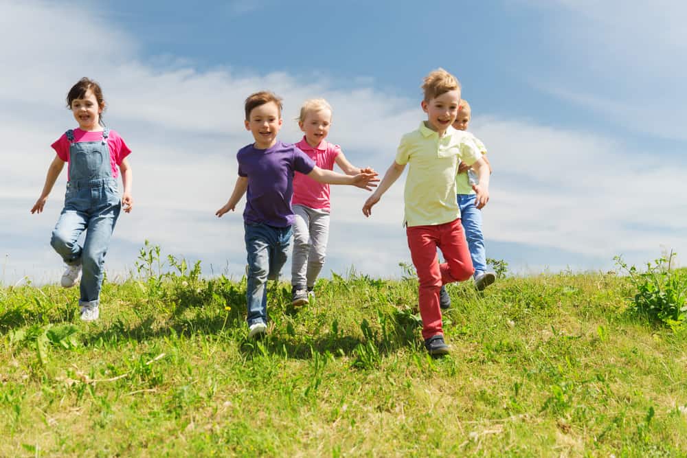 A group of kids playing outdoors.