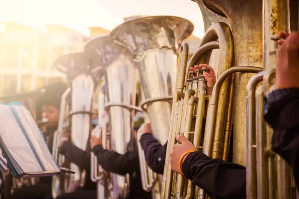 Orchestra band playing tuba instruments.