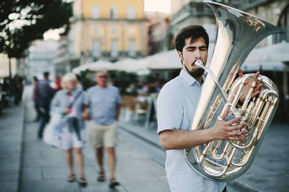 Street musician playing a tuba.