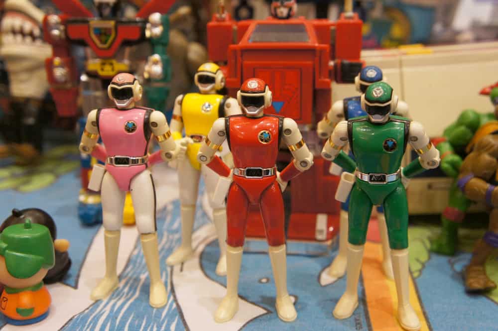 This is a close look at a set of Power Rangers toys on display.