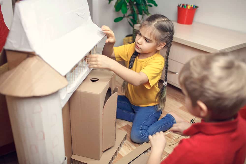 200 Best Indoor Activities for Kids 8 These are a couple of kids making a cardboard castle.