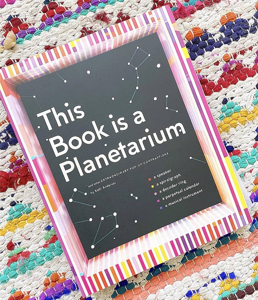 20 Perfect Gifts for 11 Year Old Boys 3 This Book Is a Planetarium: And Other Extraordinary Pop-Up Contraptions (Popup Book for Kids and Adults, Interactive Planetarium Book, Cool Books for Adults) from Brave and Kind Books.