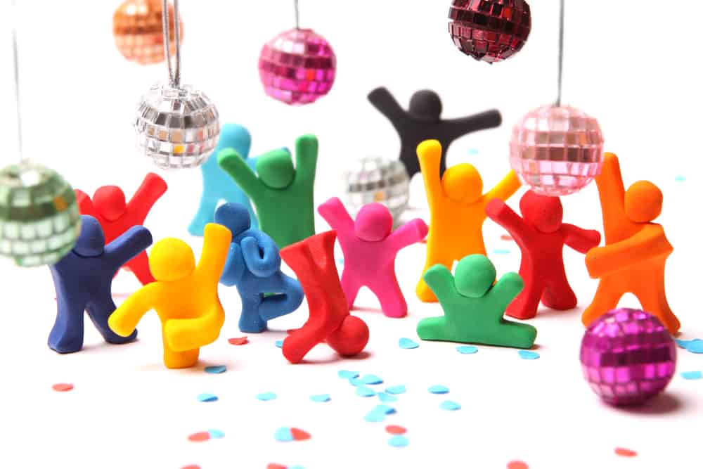 Toys that dance: Plastic toys with disco balls having a party.