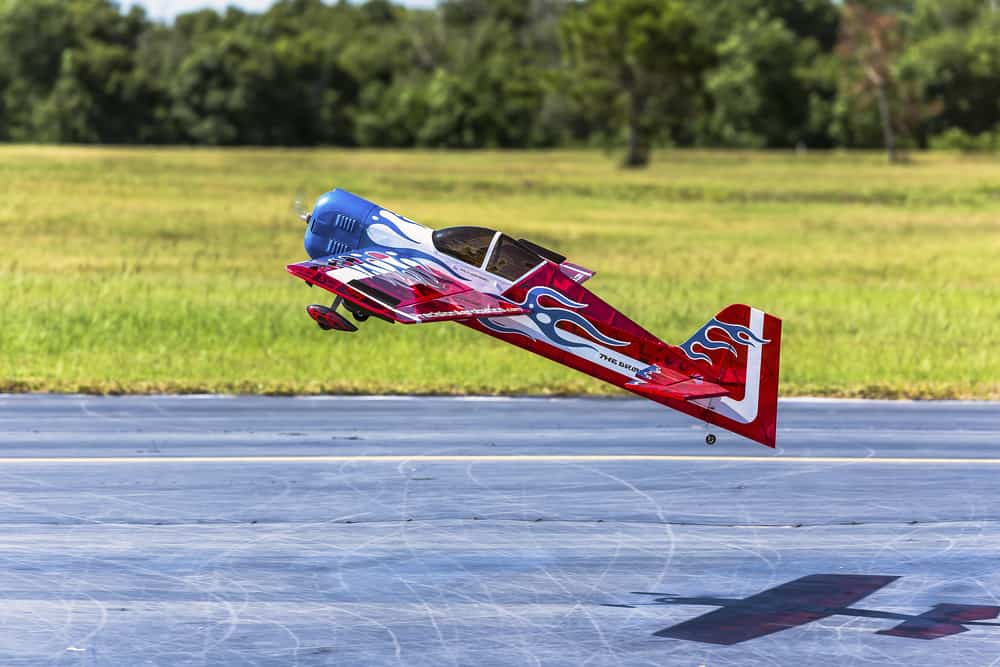 Toys that fly: A large remote control airplane takes off.