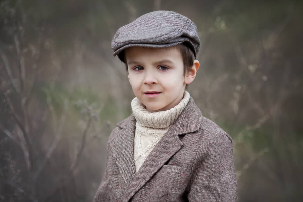 18 Popular Types of Hats for Boys (Kids) 1 Little boy in a forma suit with beret hat.