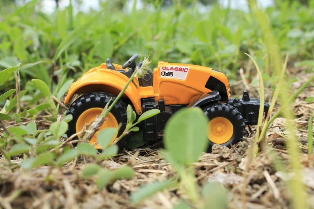 Close-up of a remote control truck outdoors.