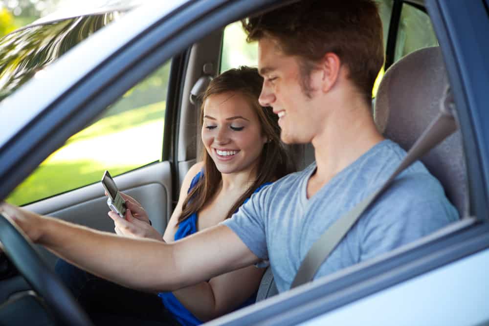 44 Best Chores for Teenagers 14 Teen driving her younger sister to see friends.