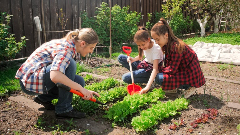 44 Best Chores for Teenagers 12 Teens helping their mom in gardening.