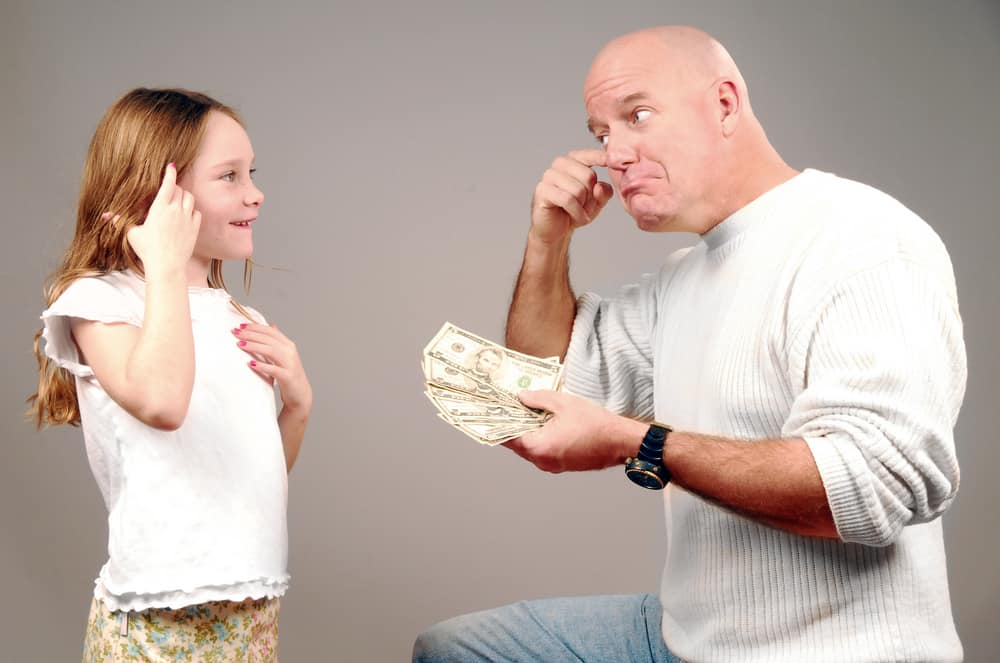 15 Best Chores for 5-6 Year Olds 18 Father thinking about giving his daughter allowance.