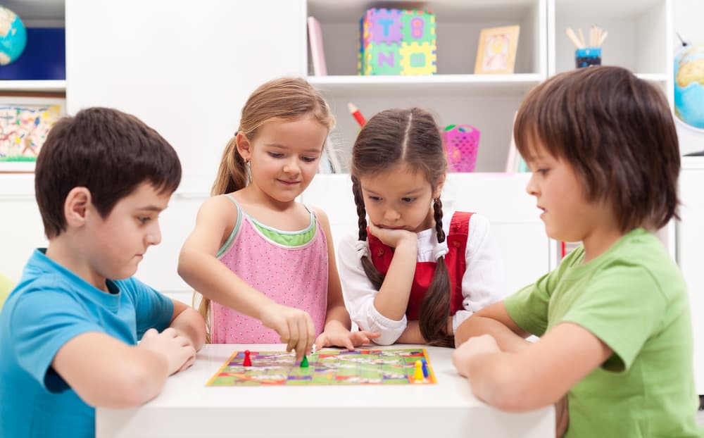 Kids playing board games at school.