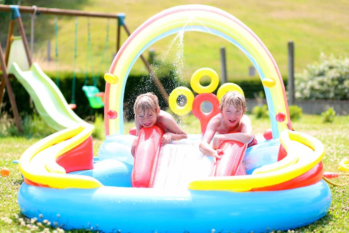 Kids playing in kiddie pool.