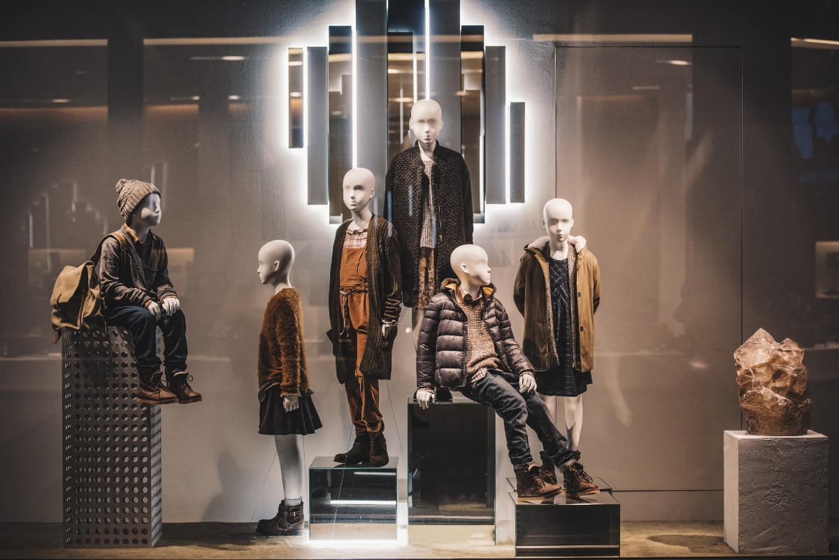Mannequins in kids clothing store.