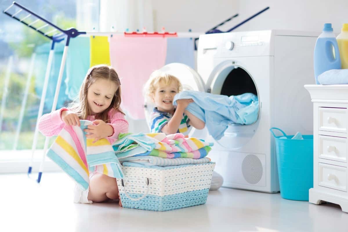 20 Best Chores for 3-4 Year Olds 6 Kids folding clean laundry.