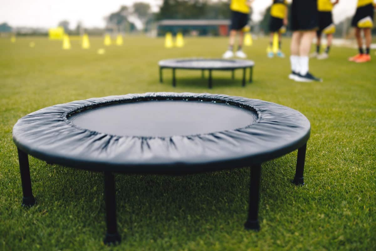 Small trampolines in a football field.