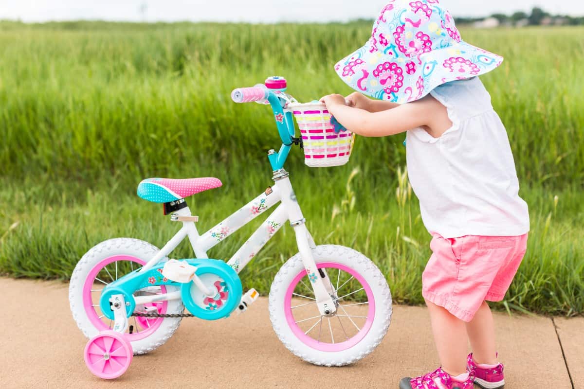 Toddler learning how to bike.