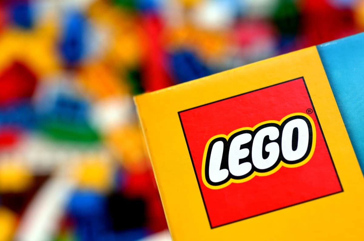 Lego logo against Lego blocks.