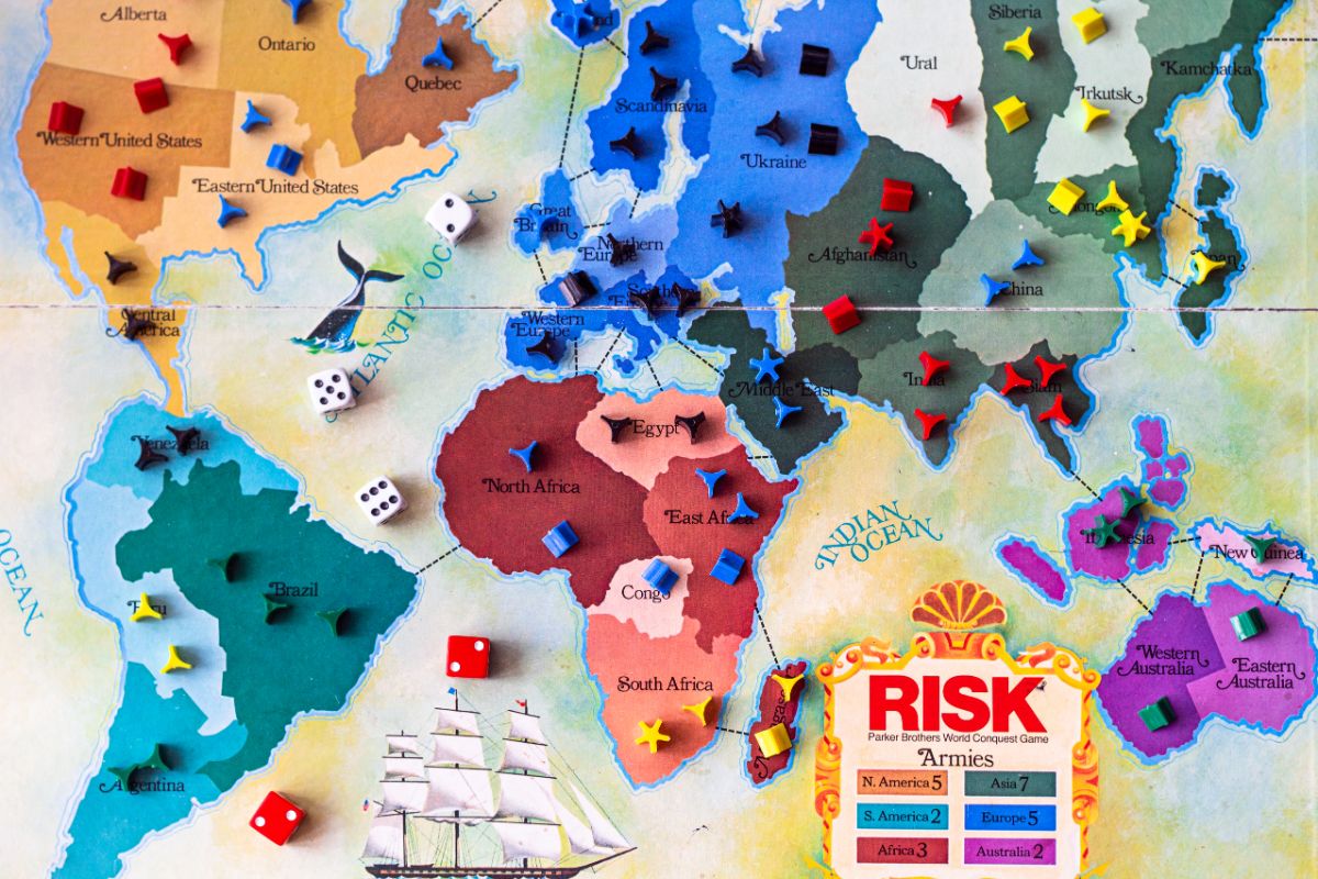 World map and dices for the board game Risk.