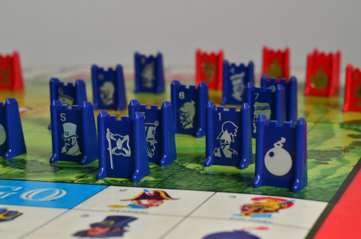 Blue and red pieces of a board game Stratego.