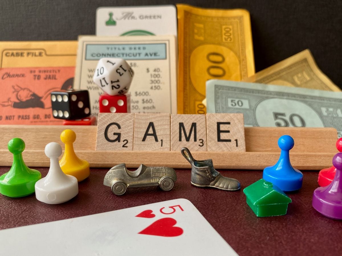 Why are Board Games So Expensive? 4 Scrabble pieces, dice, cards, and fake money.