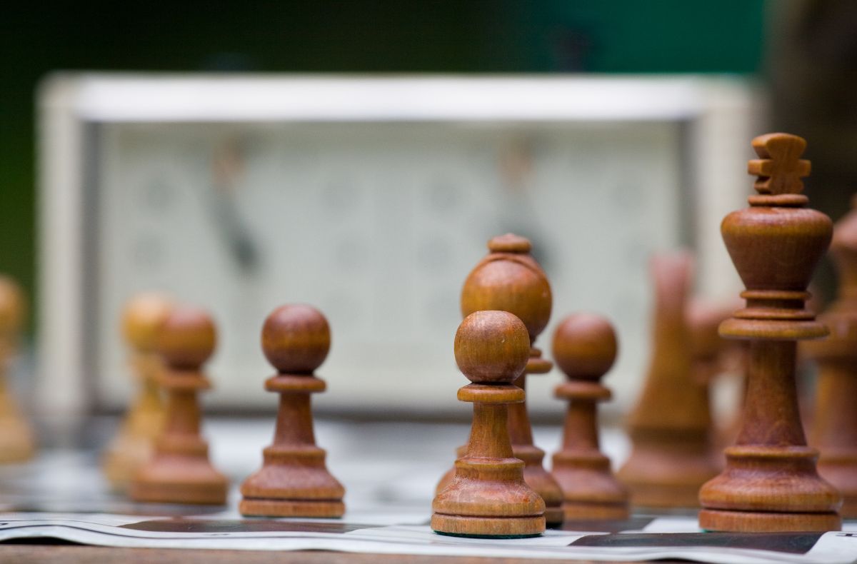 Do Old Board Games Have Value? If So, Which Ones? 2 Chess board pieces and chess timer.