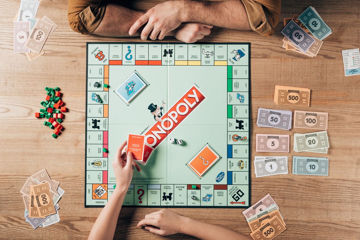17 Amazing Board Games Similar to Sorry 5 Two people playing monopoly board game.