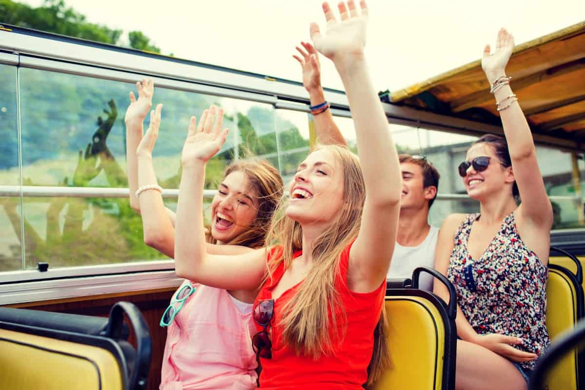 Things to do before college: Teens traveling by bus.